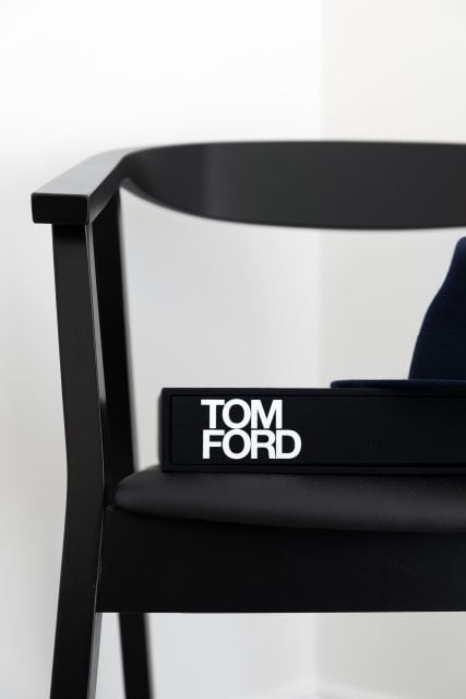 still life photography Tom Ford book on chair